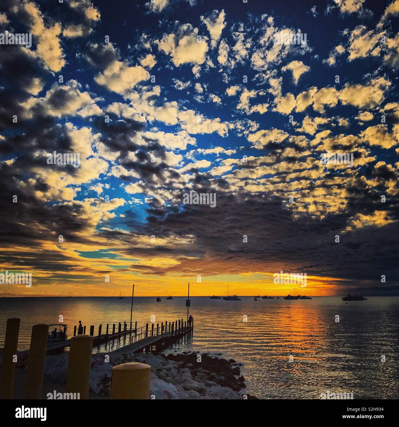 Tantabiddi sunset, Exmouth Western Australia. Looking out over Ningaloo reef - Smartphone Captured Stock Image