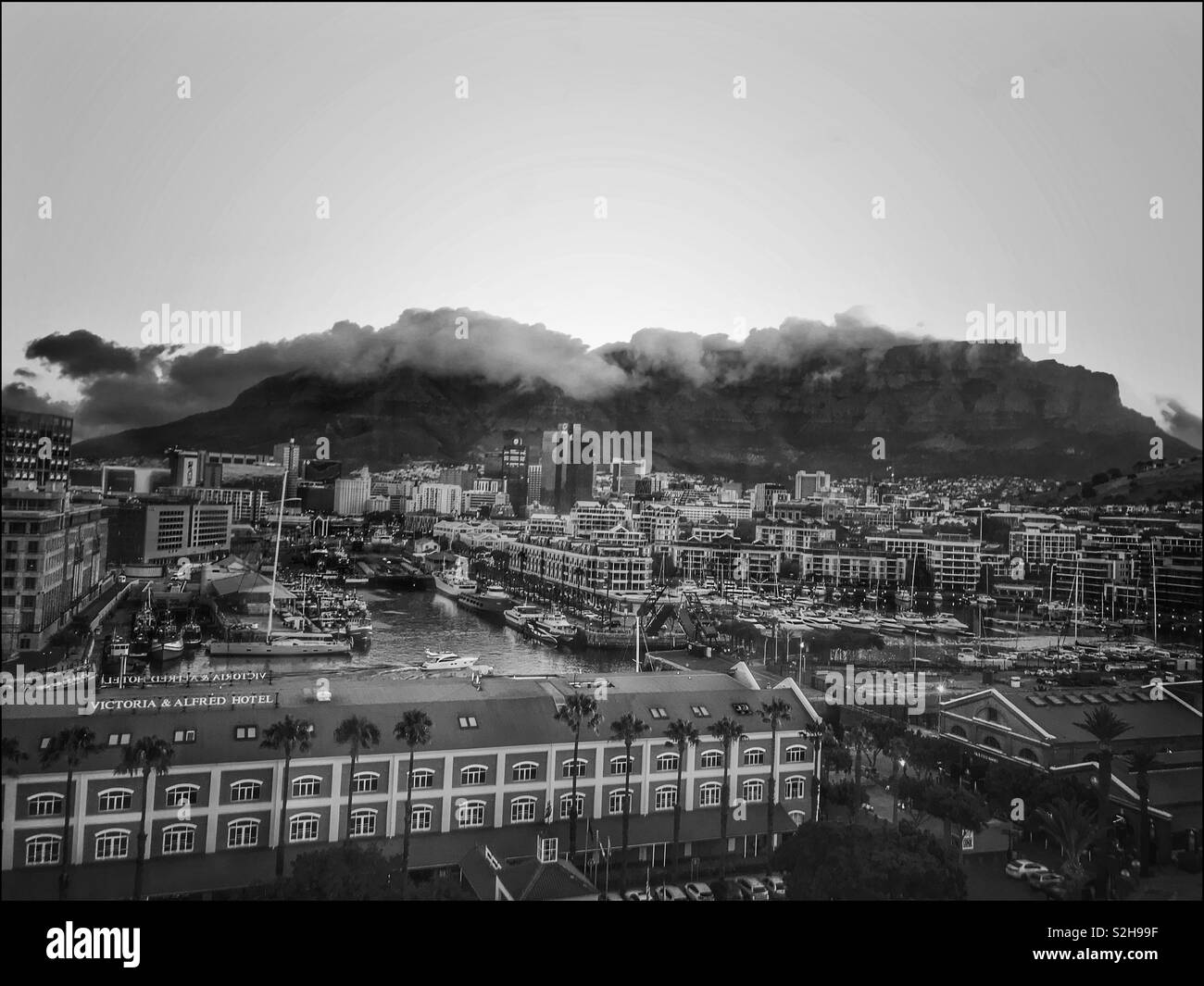 View from within a cabin on the Cape Wheel at the V&A Waterfront,Cape Town, South Africa. Black and white photo. - Smartphone Captured Stock Image