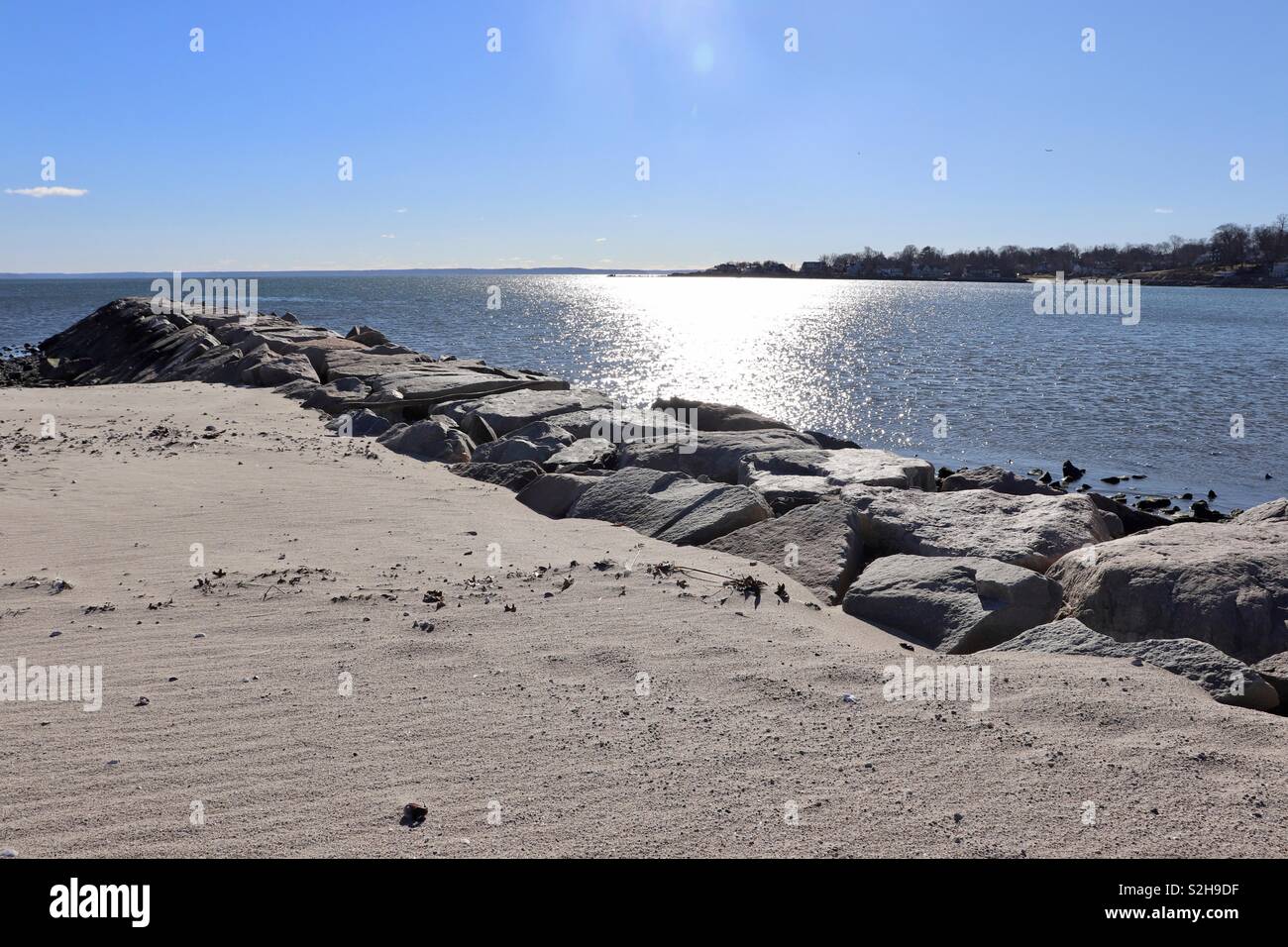 Sandbreak on the coastline Stock Photo