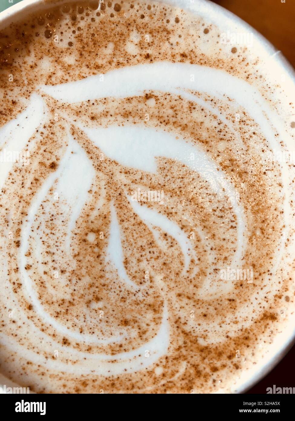 Close up of hot Chai design in mug which is ready to drink! - Smartphone Captured Stock Image