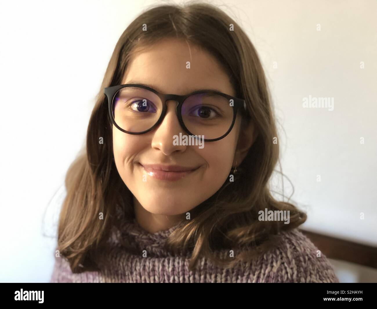 Portrait of a ten years old girl with glasses Stock Photo