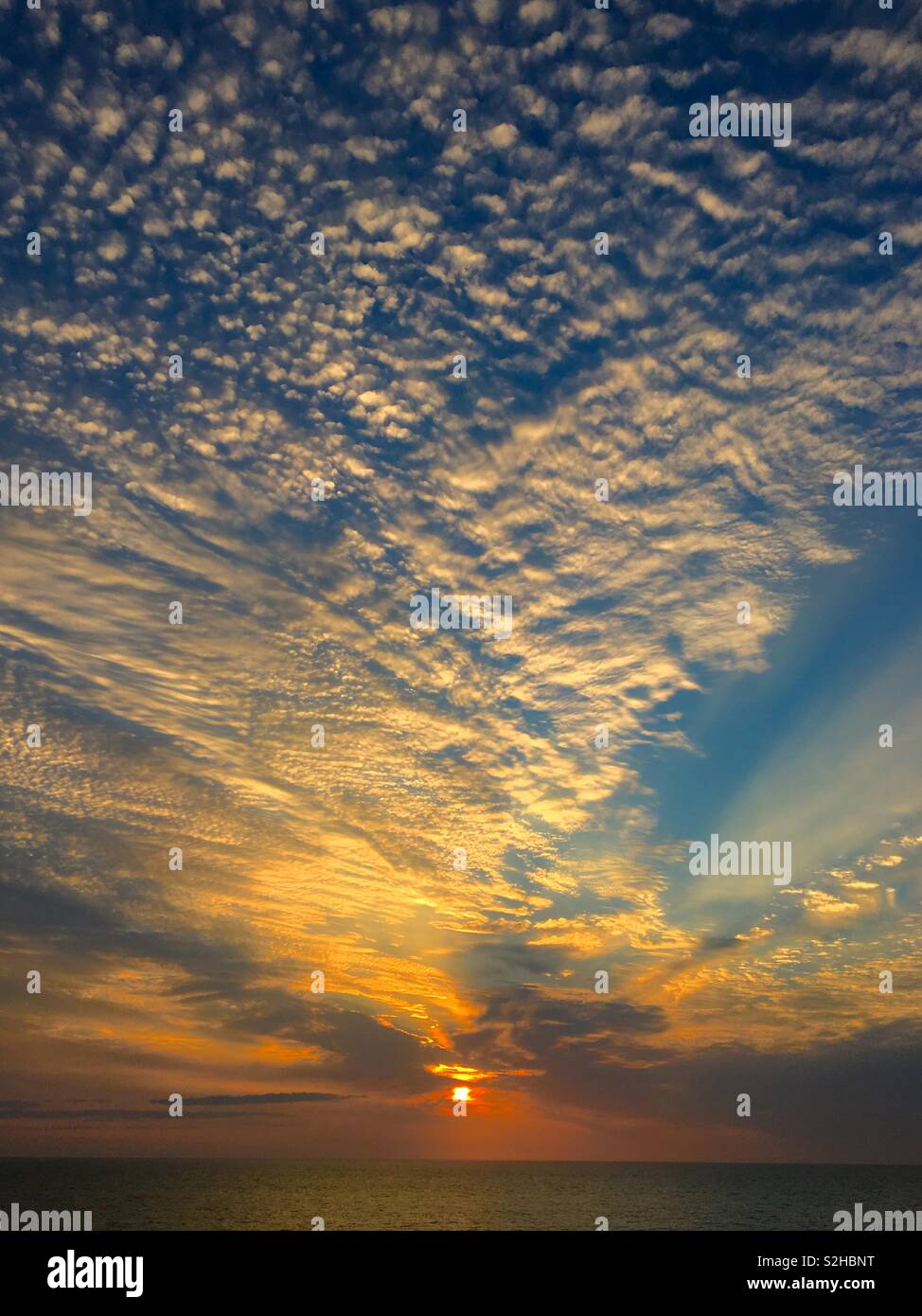 Sunrise over the ocean Stock Photo