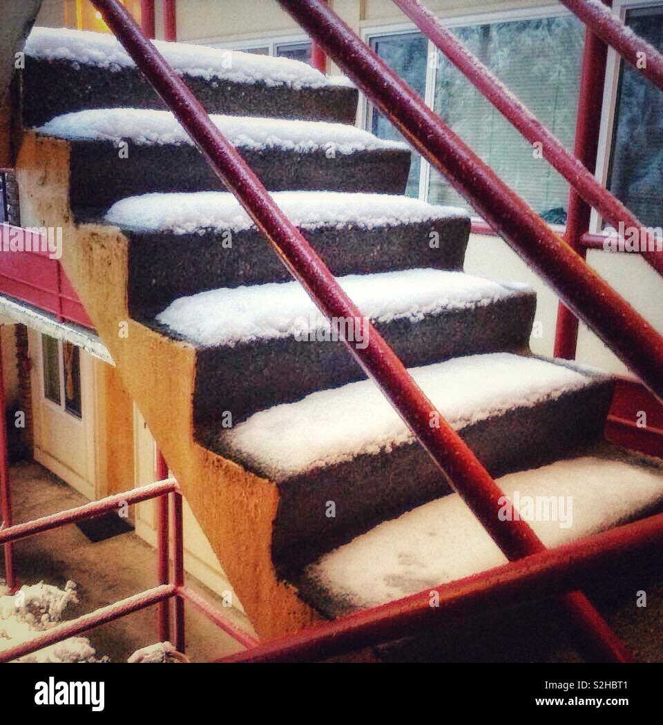 Snowy concrete steps at apartment building in Seattle - Smartphone Captured Stock Image