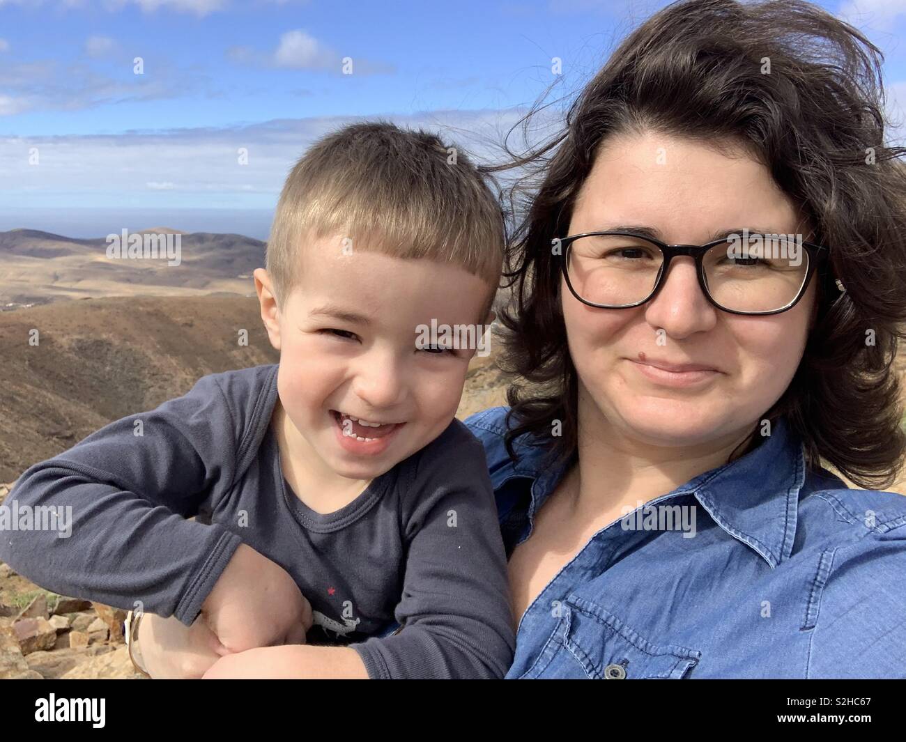 Happy mother and child outdoors - Smartphone Captured Stock Image