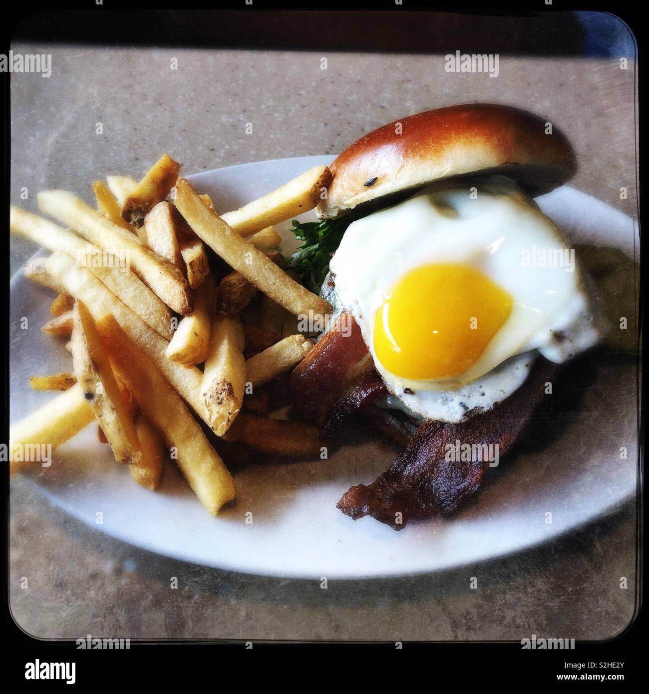 Hearty breakfast of bacon hammer and eggs - Smartphone Captured Stock Image