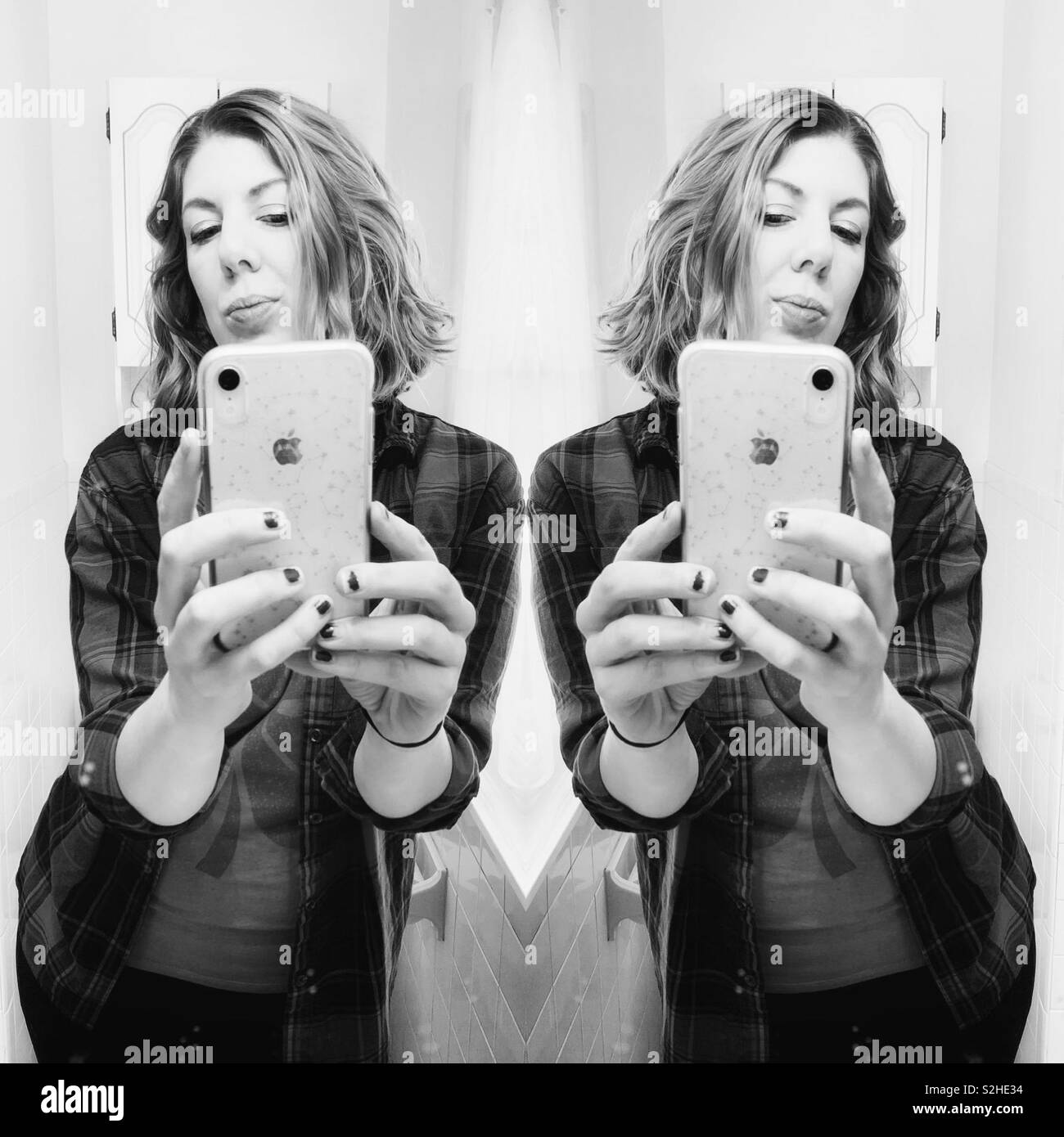 Woman taking a selfie - Smartphone Captured Stock Image