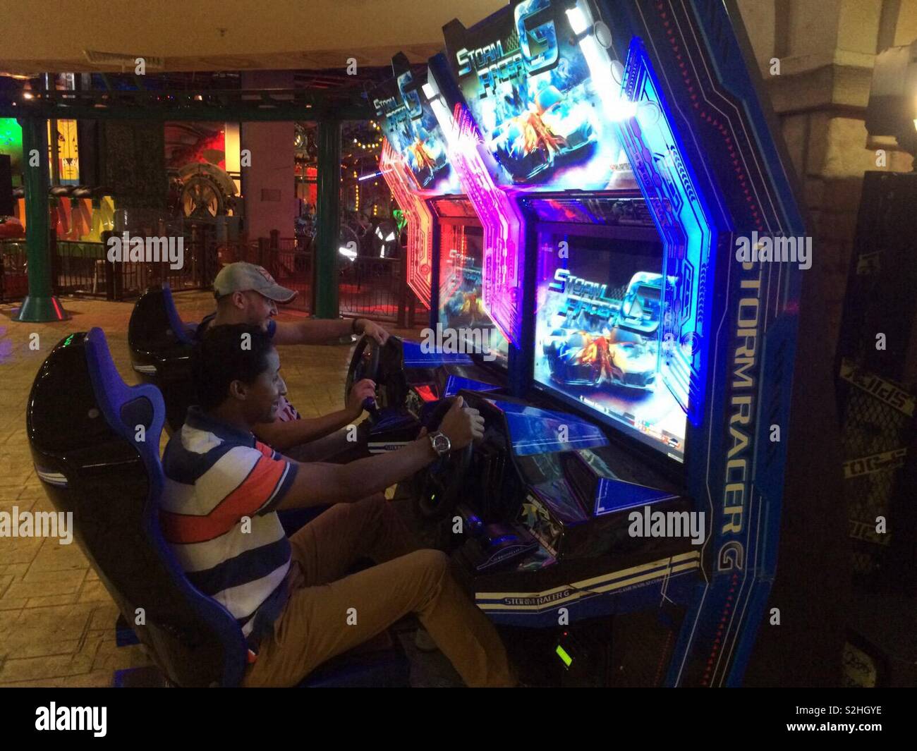 Arcade games in mall Stock Photo - Alamy