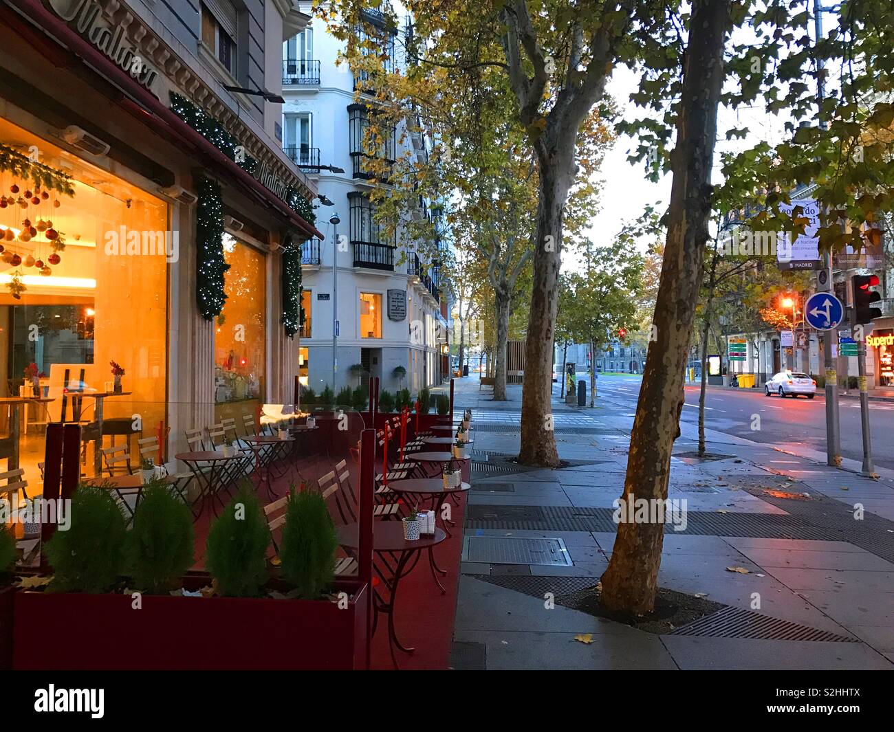 Terrace and street at dawn. Serrano street, Madrid, Spain. - Smartphone Captured Stock Image