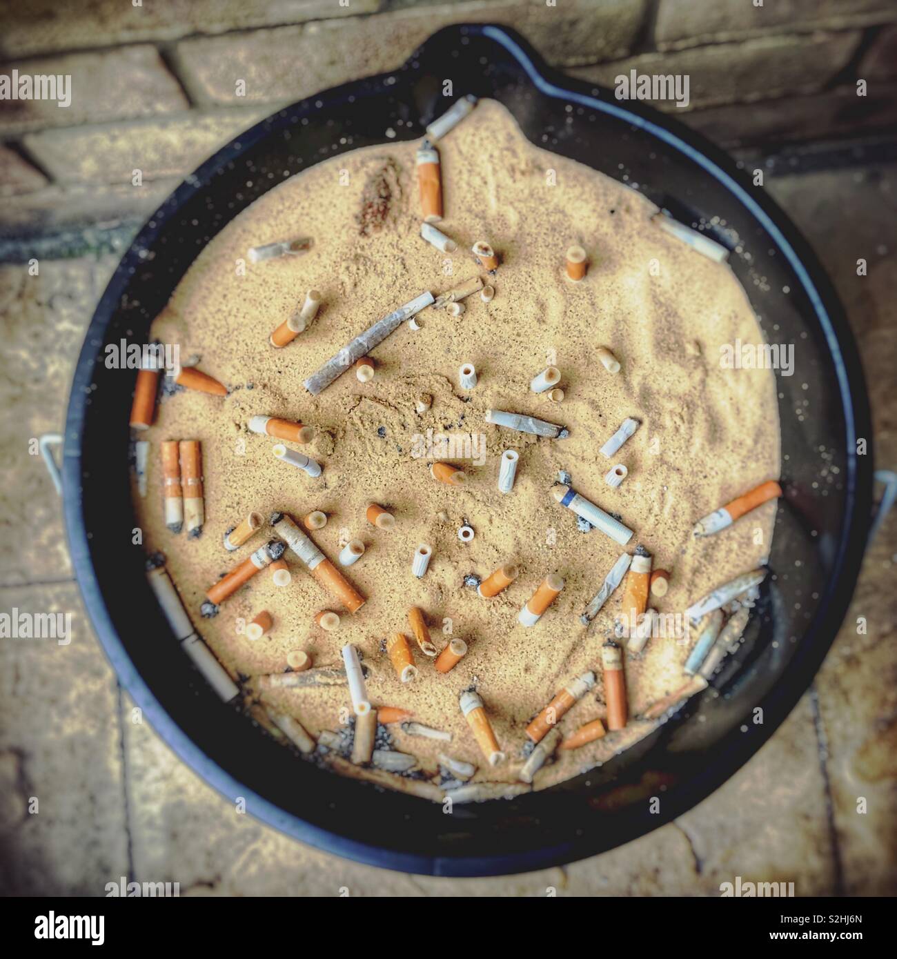 Sand bucket for cigarette butts Stock Photo