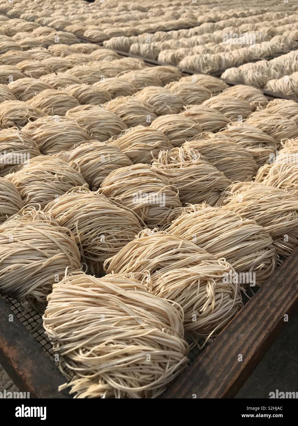 Prepared noodles for drying on open air - Smartphone Captured Stock Image