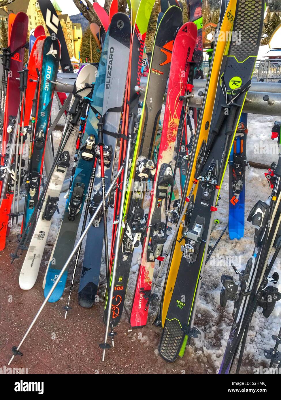 Row of skis and snowboards lined up at Whistler Blackcomb in ...