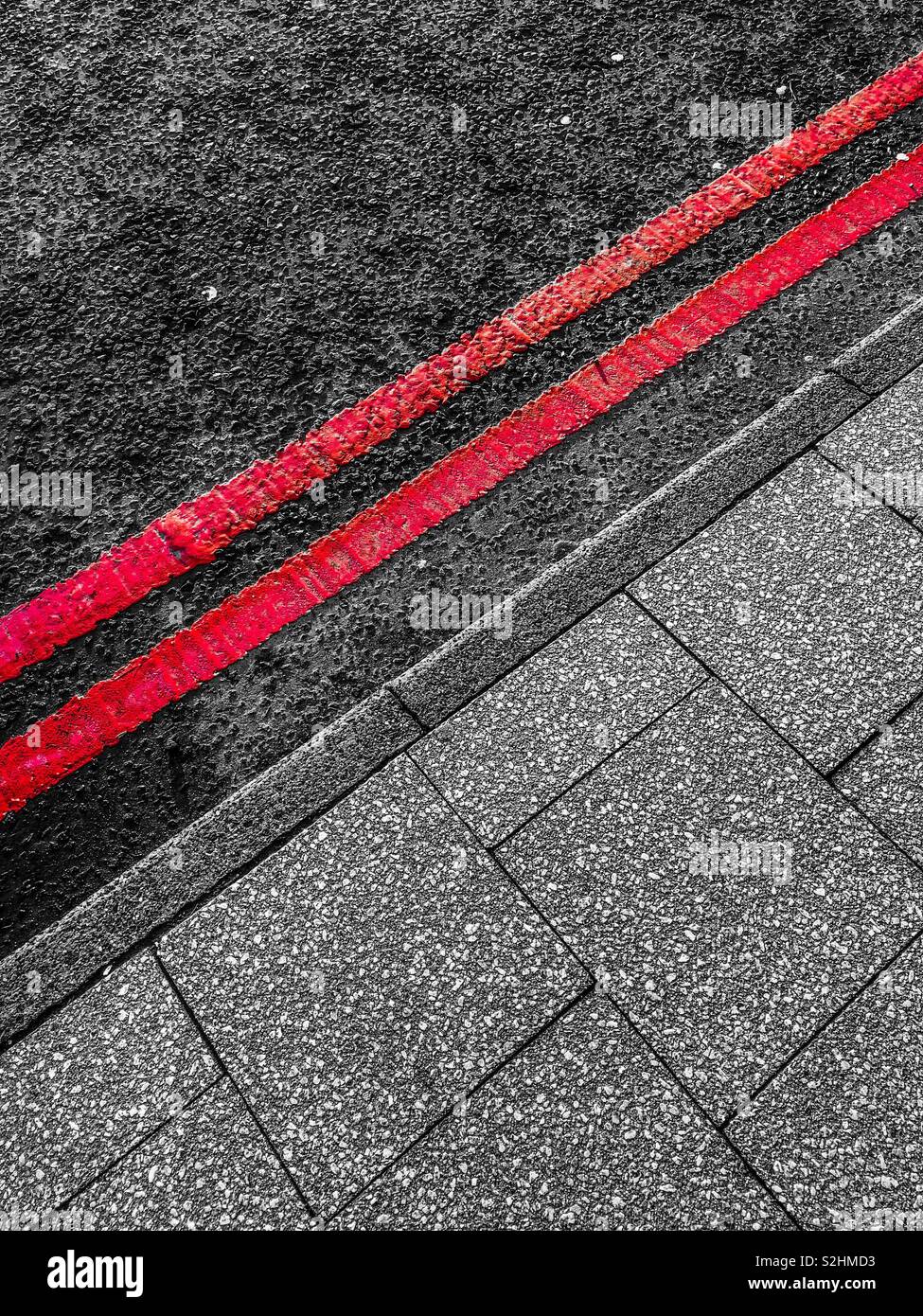 Red line road markings. Scotland. UK. Stock Photo