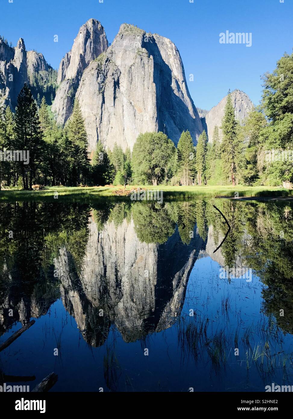 Sentinel Rock and the Yosemite Valley reflecting in the pond. Yosemite, California USA. Stock Photo