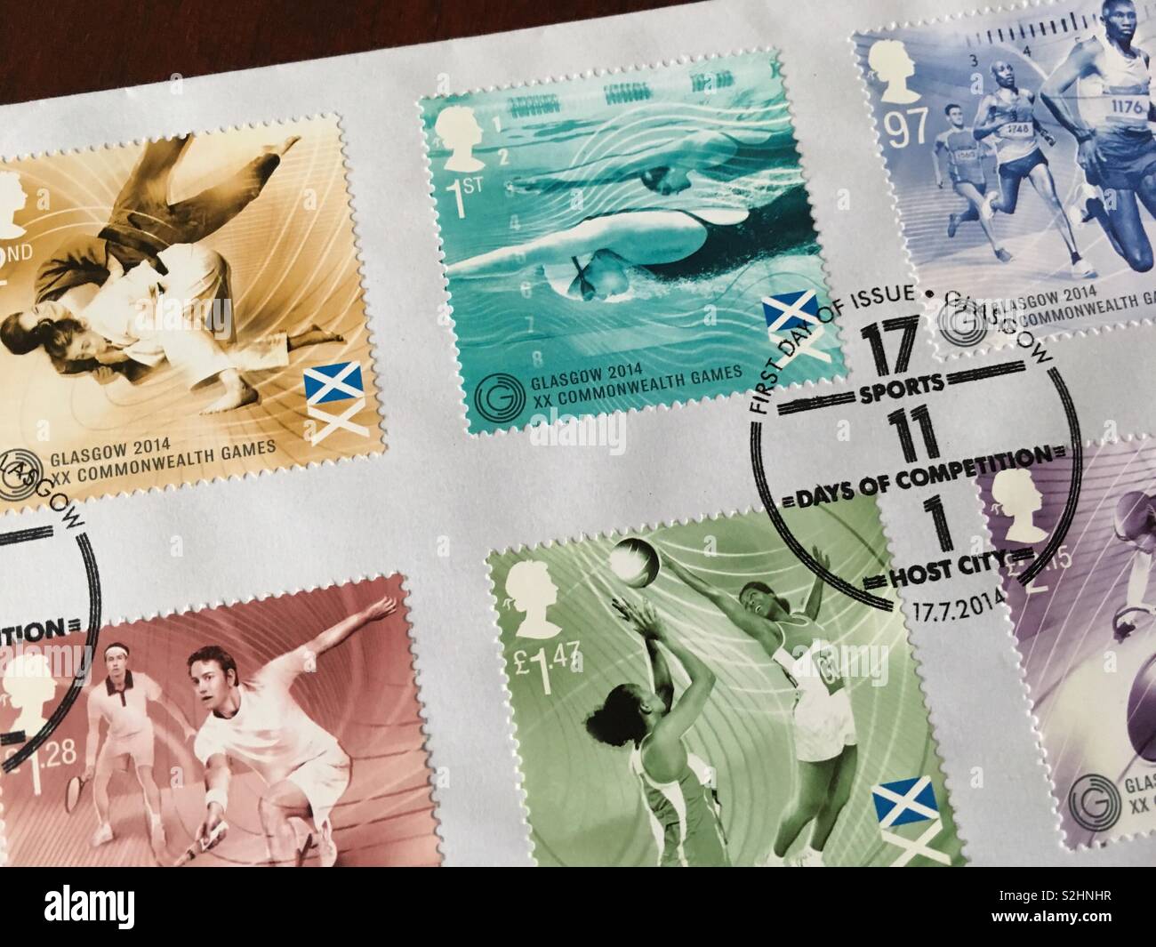 Great Britain stamps first day cover - Glasgow commonwealth games - Smartphone Captured Stock Image