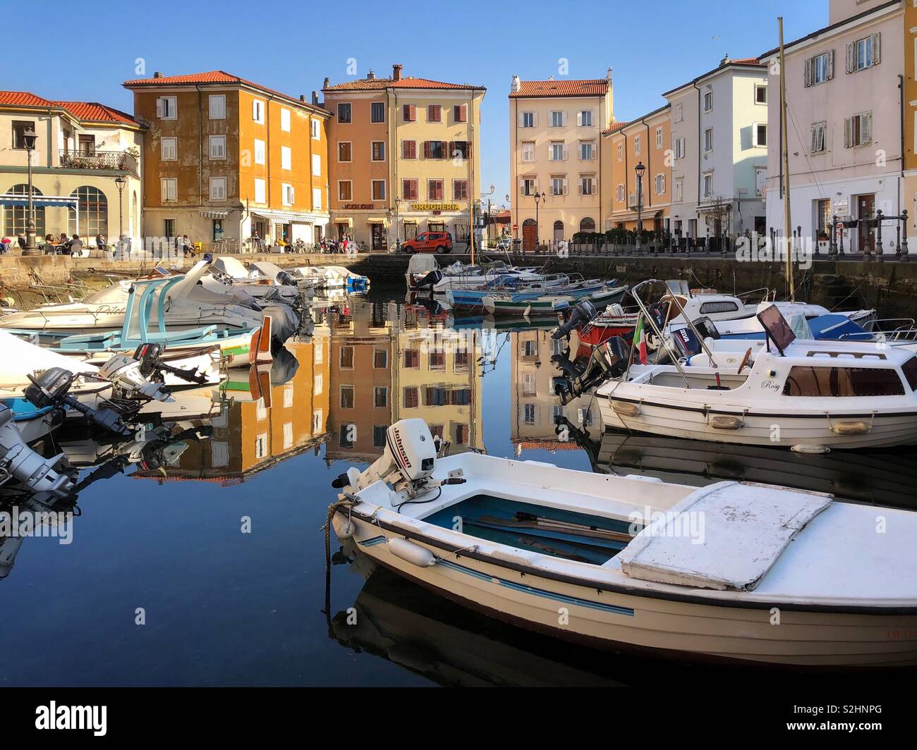 Boats moored in old port of Muggia, Friuli Venezia Giulia, Italy - Smartphone Captured Stock Image