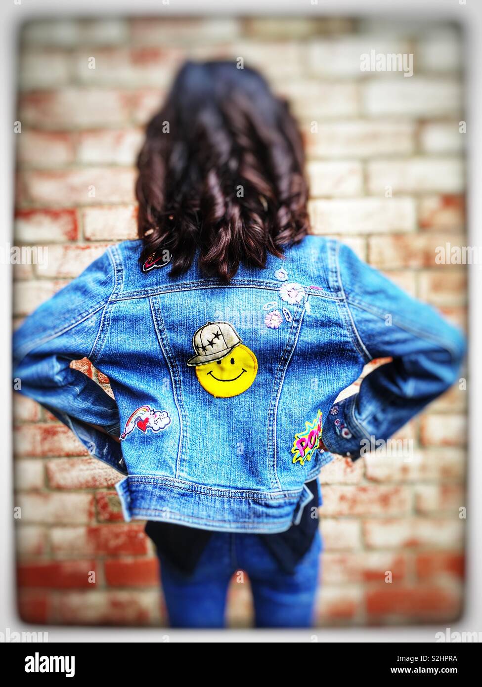 Girl in denim clothes Stock Photo Alamy