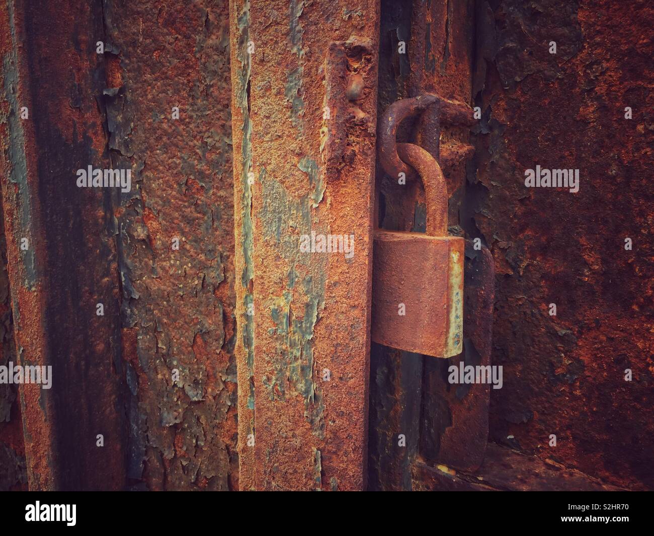 Old lock on rusted gate - Smartphone Captured Stock Image