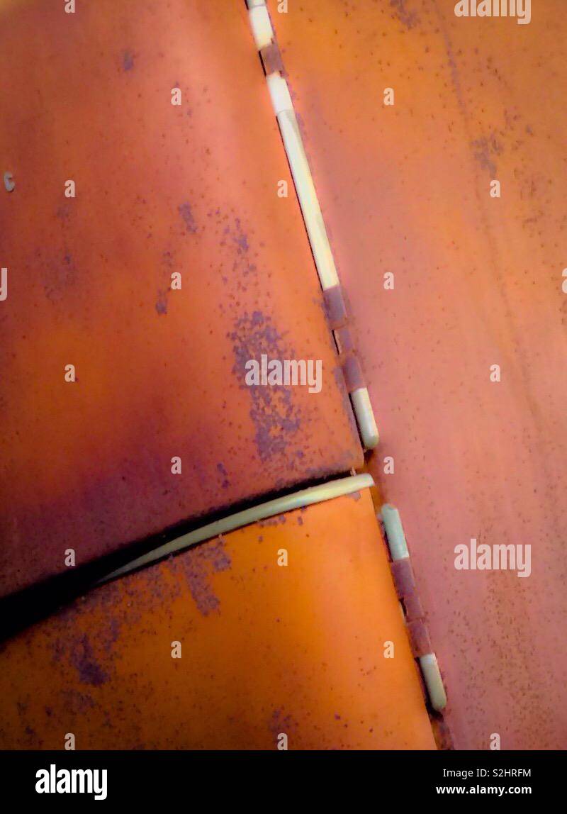 Vivid orange colored rust on old refrigerator Stock Photo Alamy