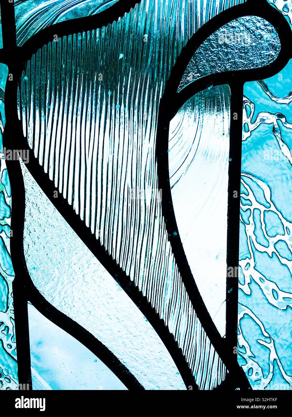 Blue stained glass Stock Photo - Alamy