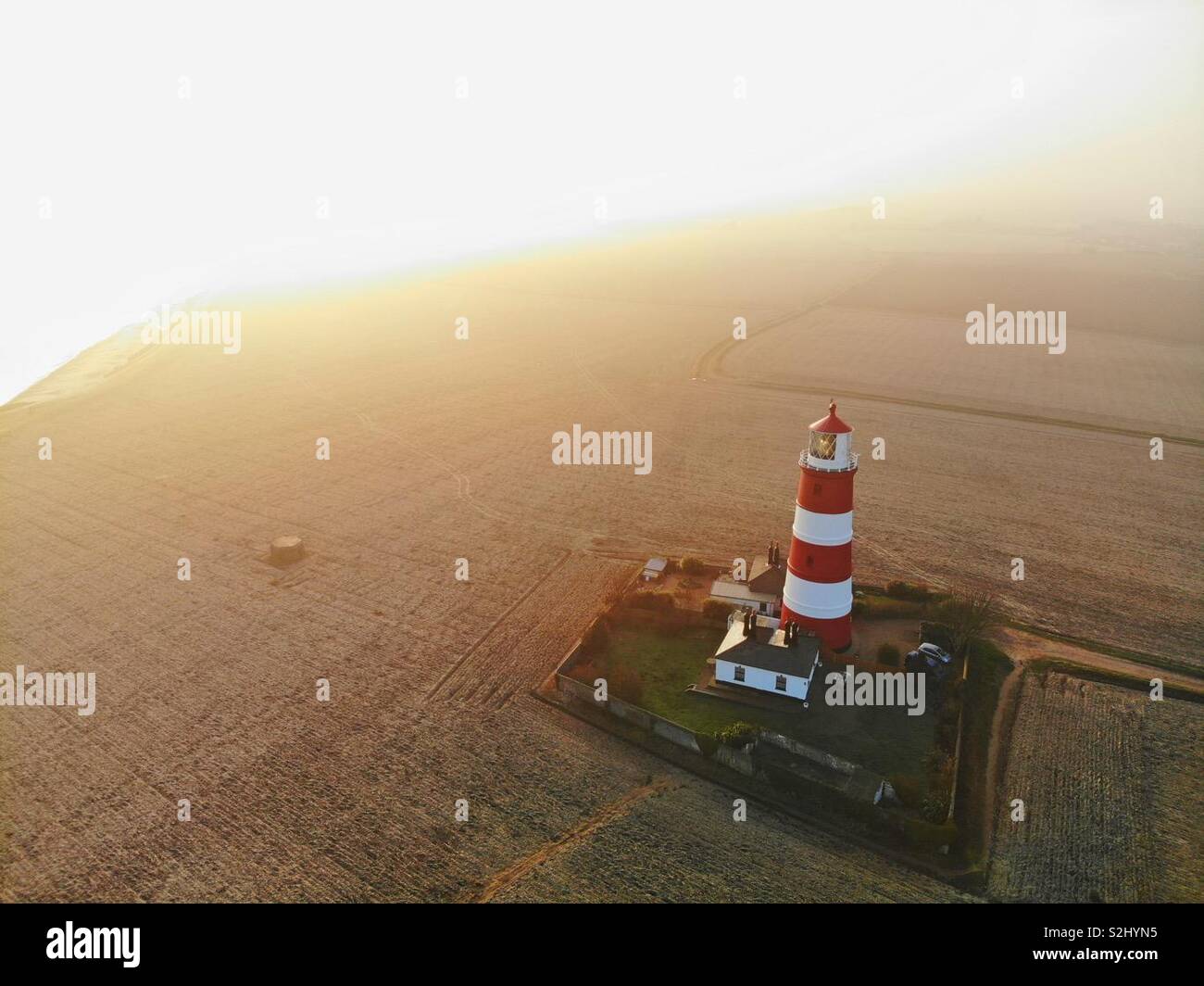 Happisburgh lighthouse from above at sunrise in winter - Smartphone Captured Stock Image
