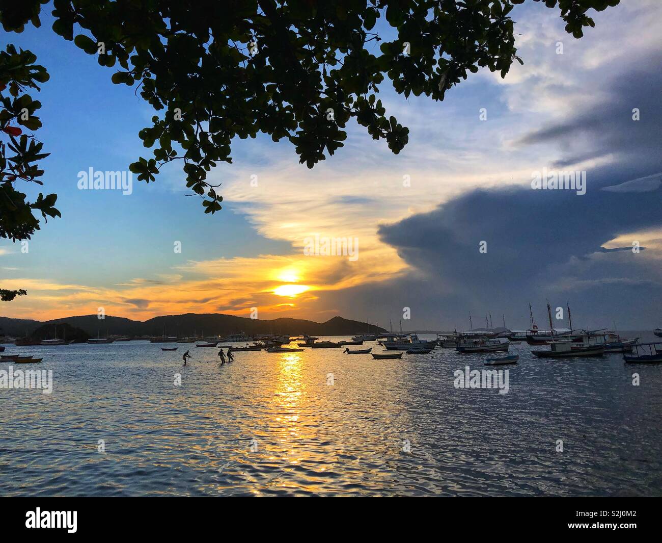 The sunset over the Atlantic in Búzios, Brazil. - Smartphone Captured Stock Image