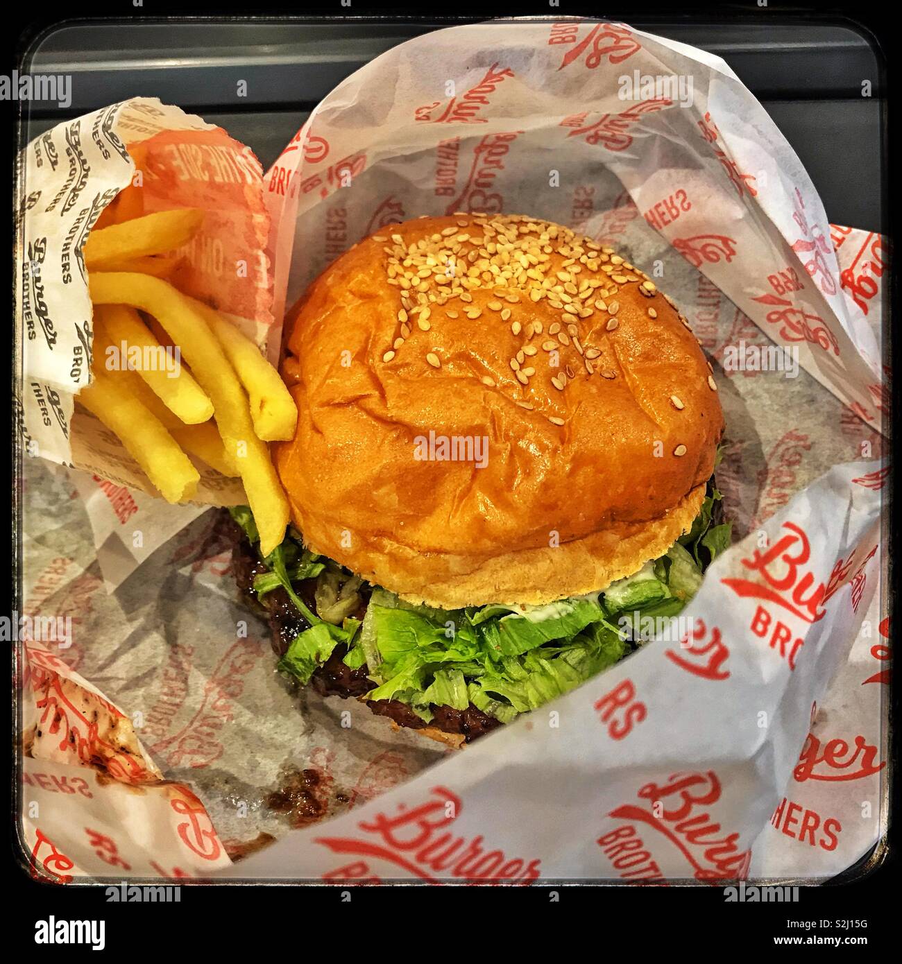Hamburger and fries from Burger Brothers, Stellenbosch, South Africa. - Smartphone Captured Stock Image