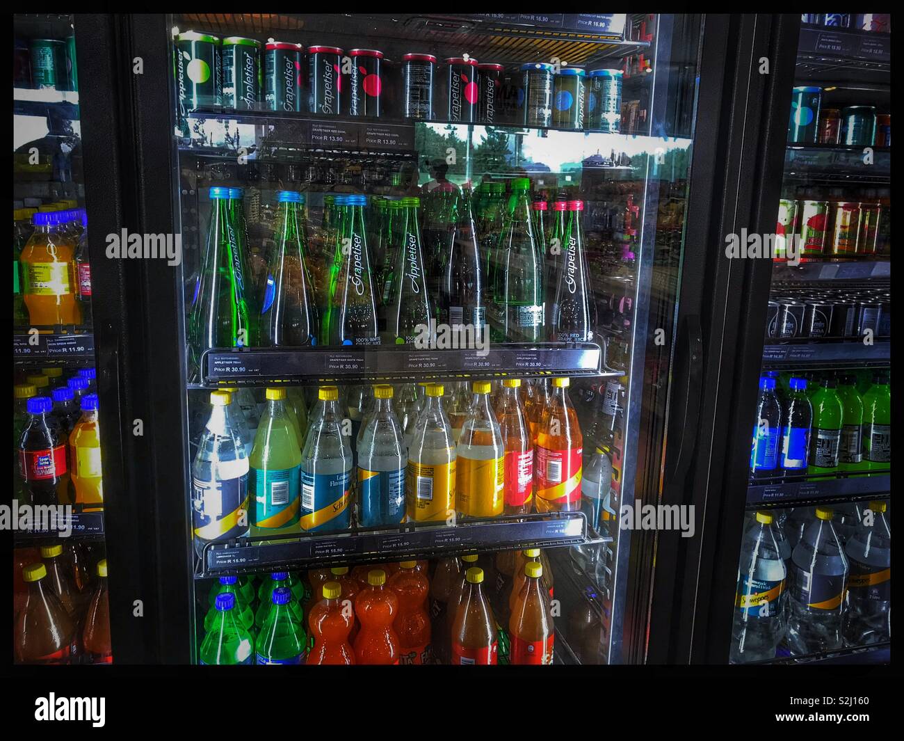Cold drinks in fridge Stock Photo Alamy