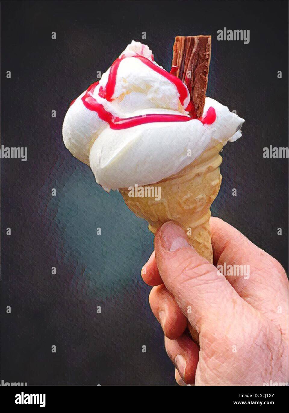 Ice cream in a waffle cone with raspberry sauce and a chocolate flake in the top - 99 - Smartphone Captured Stock Image Ice cream in a waffle cone with raspberry sauce and a chocolate flake in the top - 99 - Smartphone Captured Stock Image