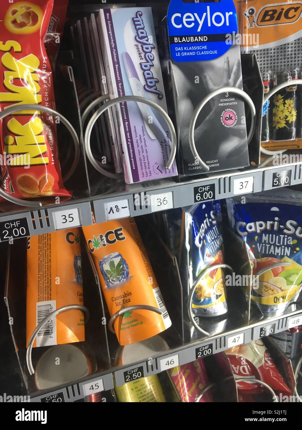 The vital components of a Swiss Holiday according to the vending machine fillers in Lauterbrunnen cannabis tea, condoms and a pregnancy test. Stock Photo