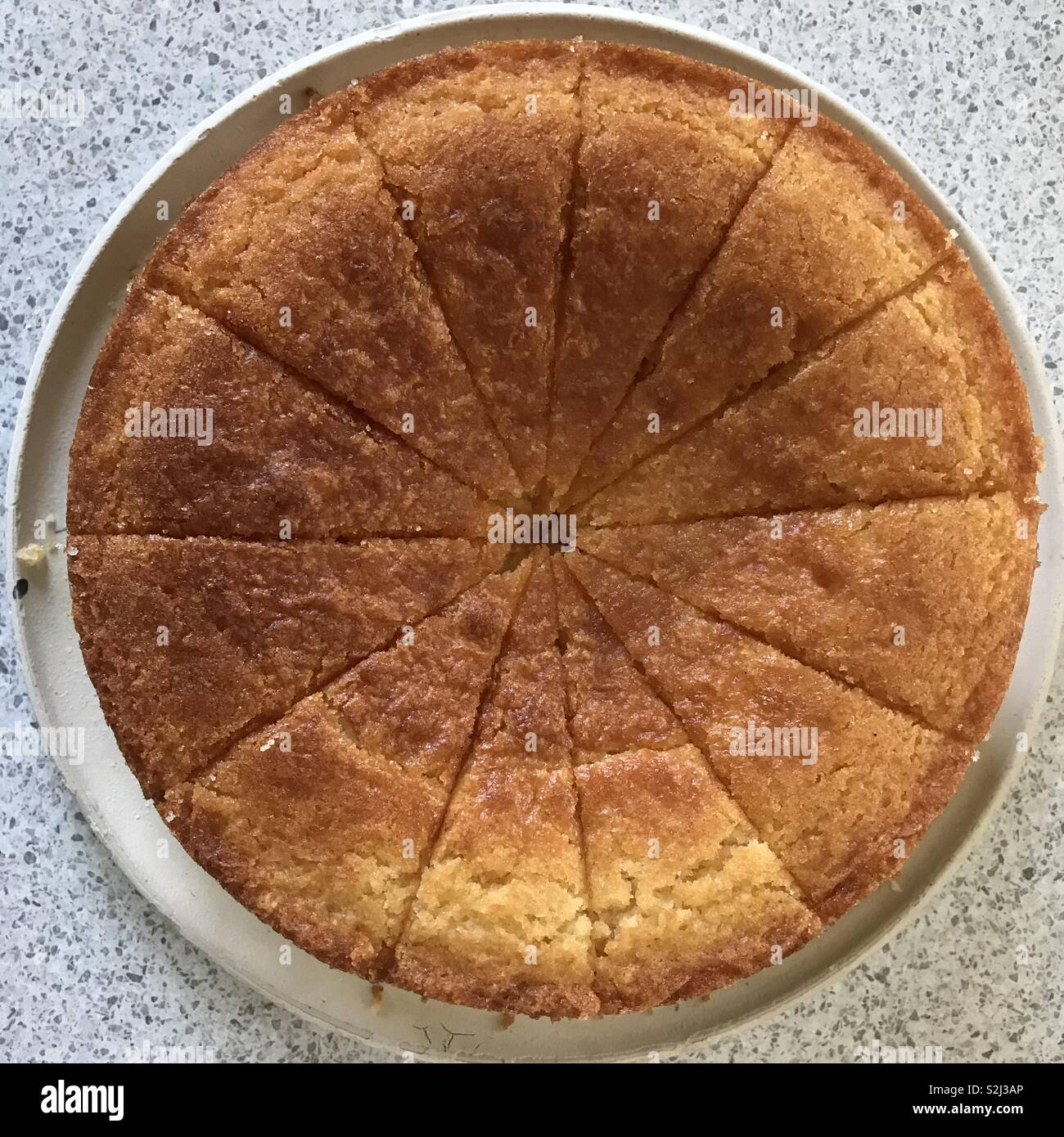 Traditional Russian sliced pie Kurnik close up on a slate board on the  table. vertical Stock Photo - Alamy