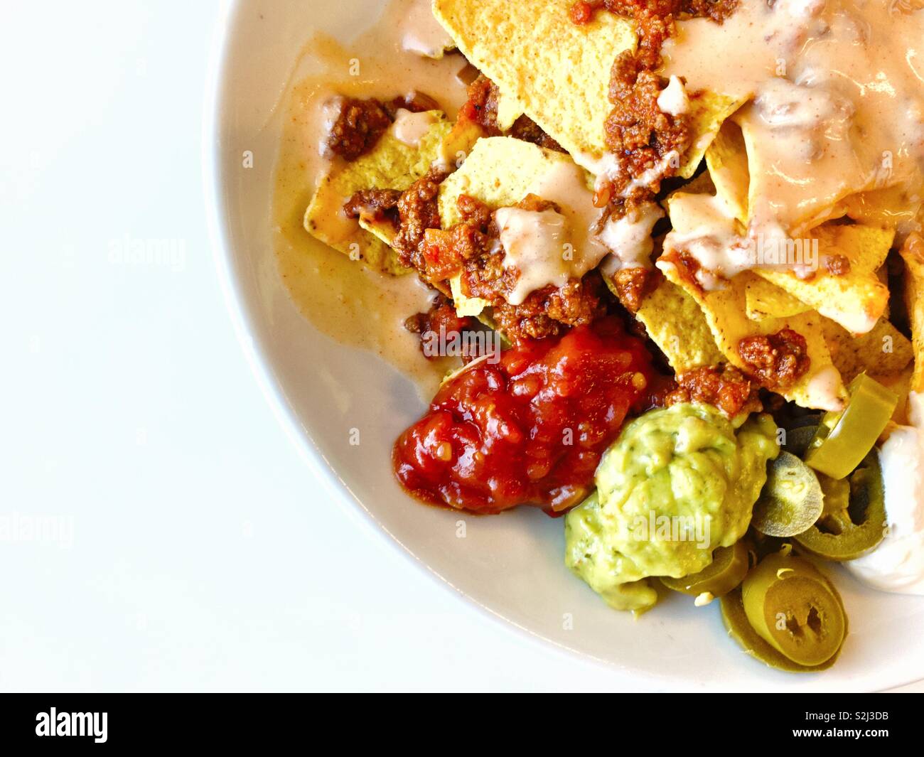 A plate of nachos. Stock Photo