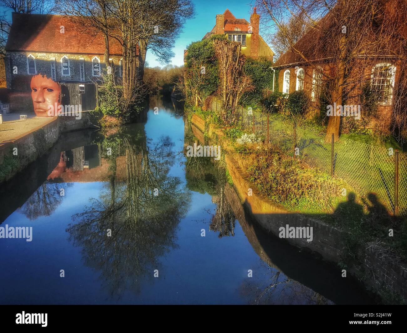 Shadow of a couple on a bridge Stock Photo - Alamy