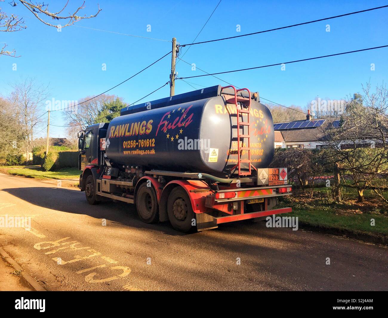 Oil tanker lorry delivering domestic heating oil, Medstead, Alton, Hampshire, England,United Kingdom. - Smartphone Captured Stock Image