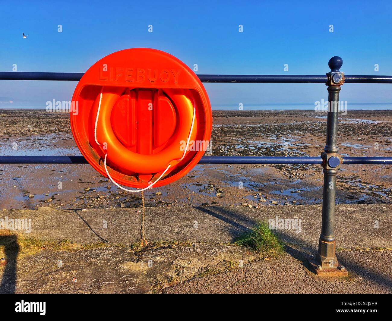 Life preserver on Mumbles promenade, Swansea, South West Wales, February. Stock Photo