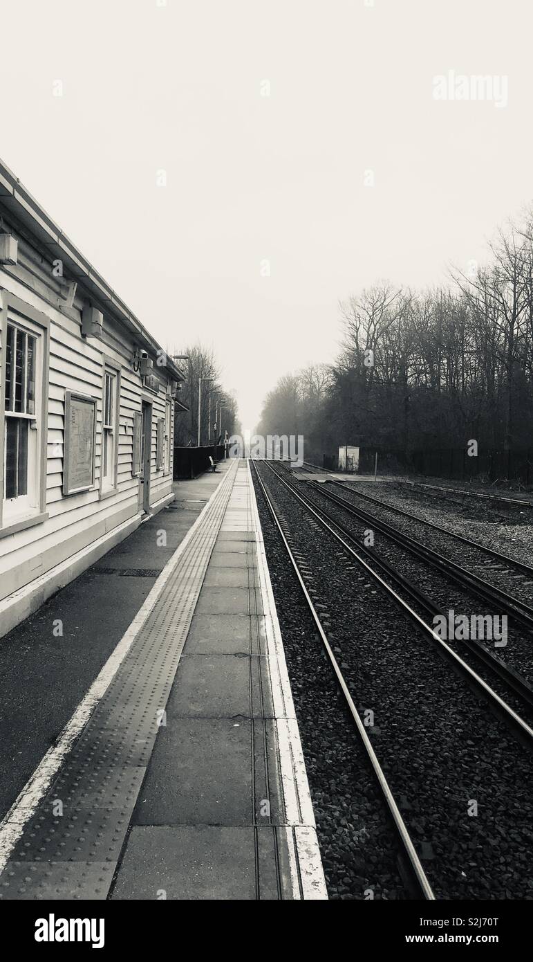 Railway station, platform and tracks in Kent, England. March 2019. - Smartphone Captured Stock Image