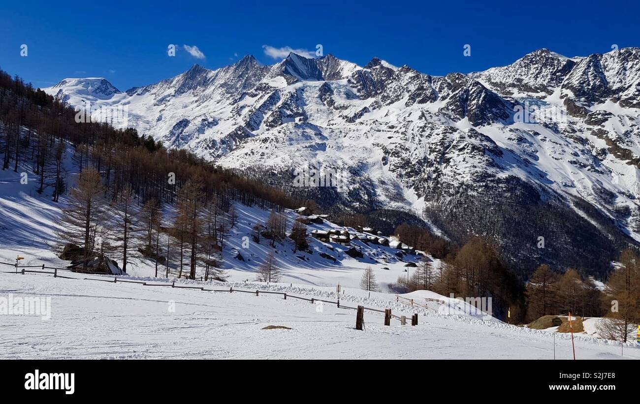View of Mischabel mountains from Hohsaas skislopes, Saas Grund, Wallis, Switzerland. Stock Photo