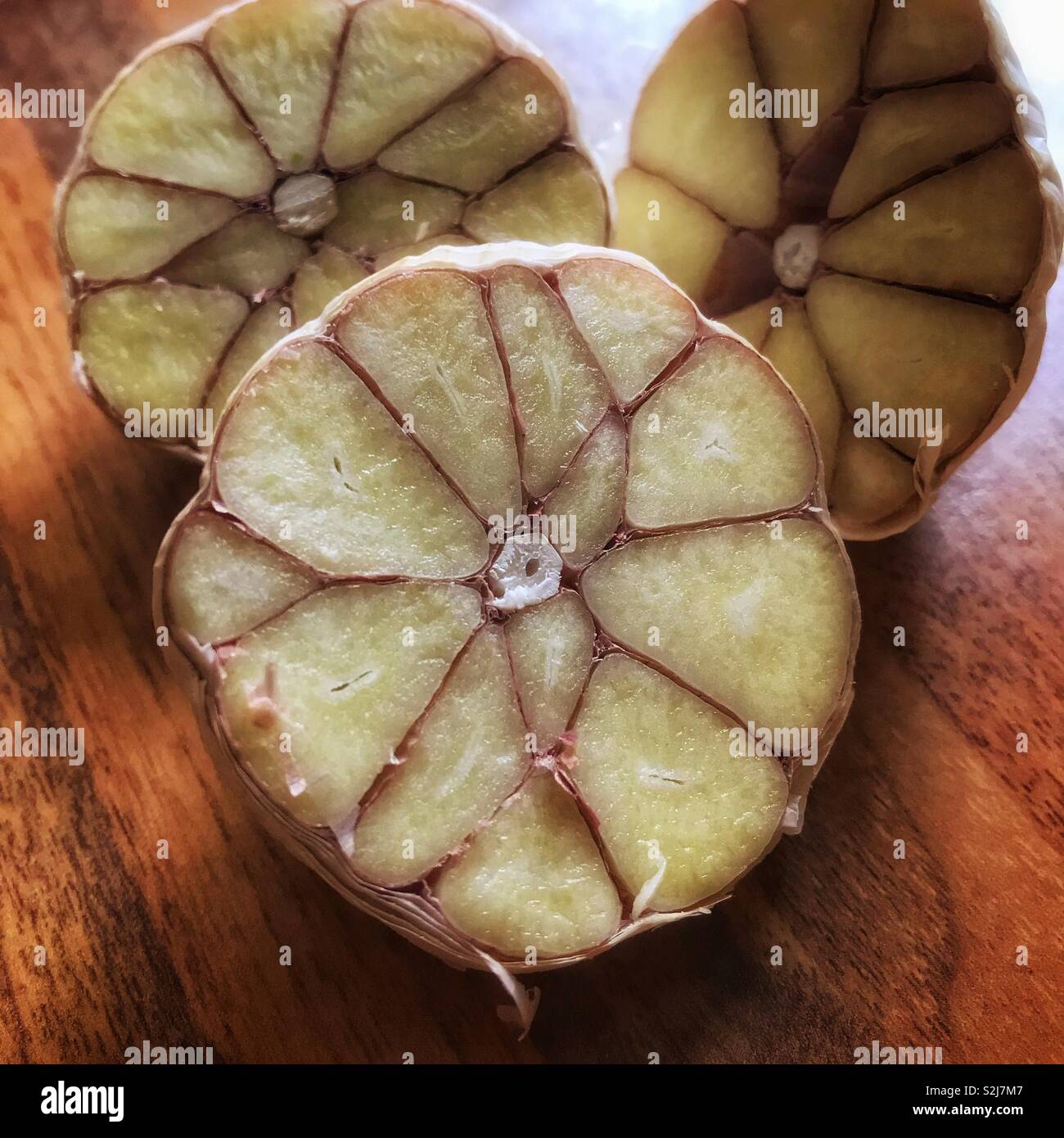 Garlic bulbs cut in half - Smartphone Captured Stock Image