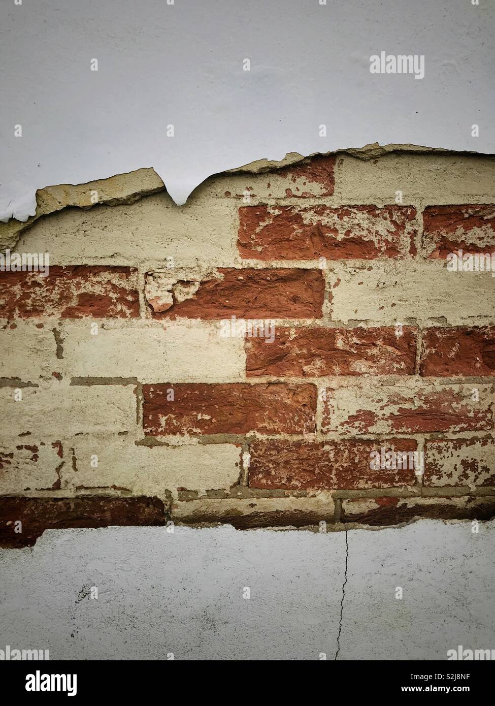 An exposed brick wall Stock Photo