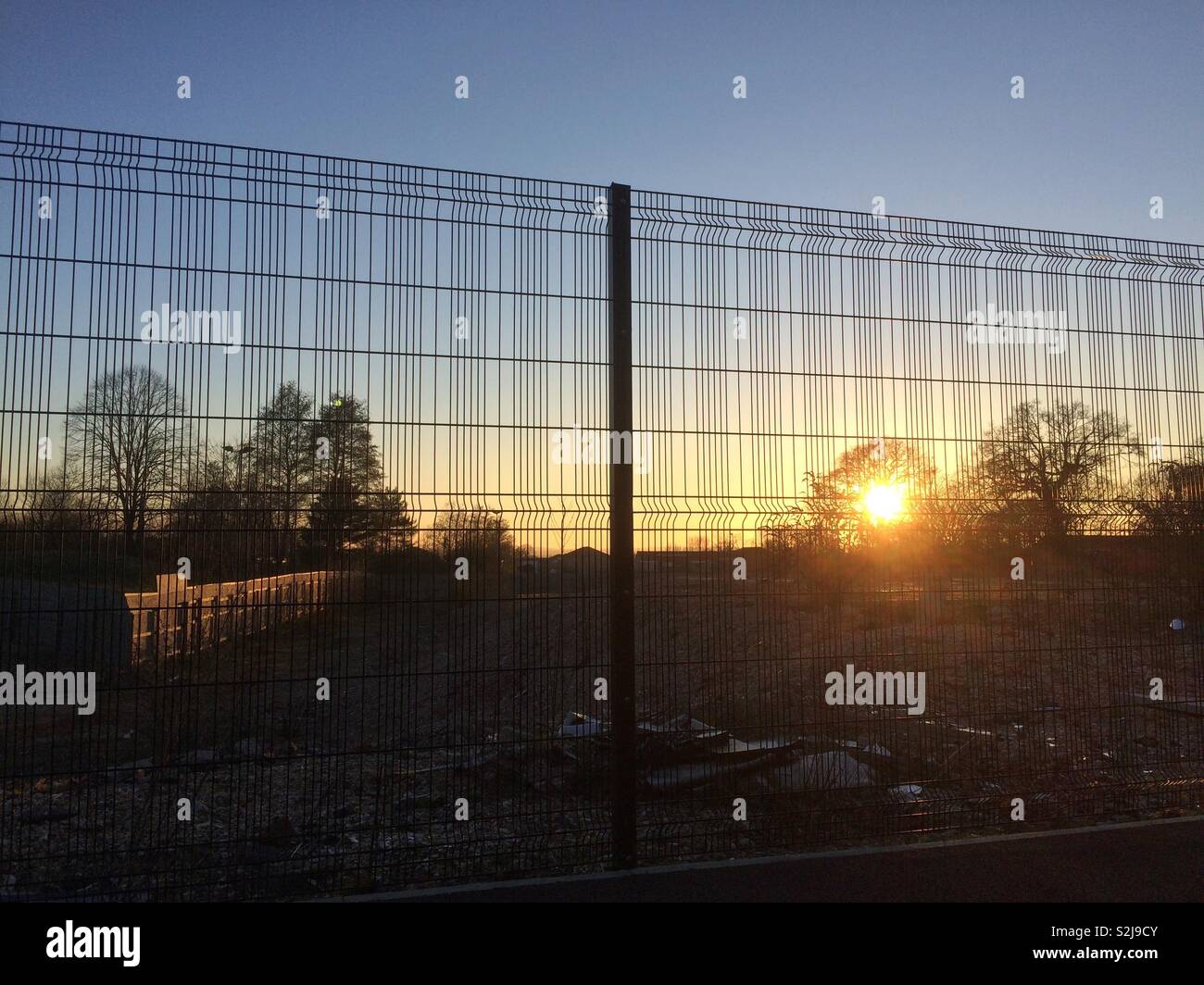 Fence at the sunset - Smartphone Captured Stock Image
