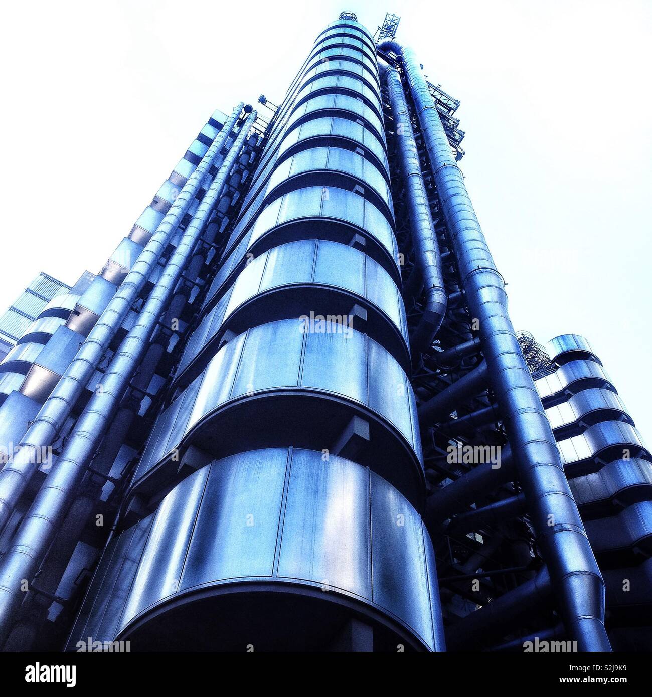 Detail of the Bowellism style of architecture of the stainless steel Lloyds building in the City of London, England, UK. Stock Photo