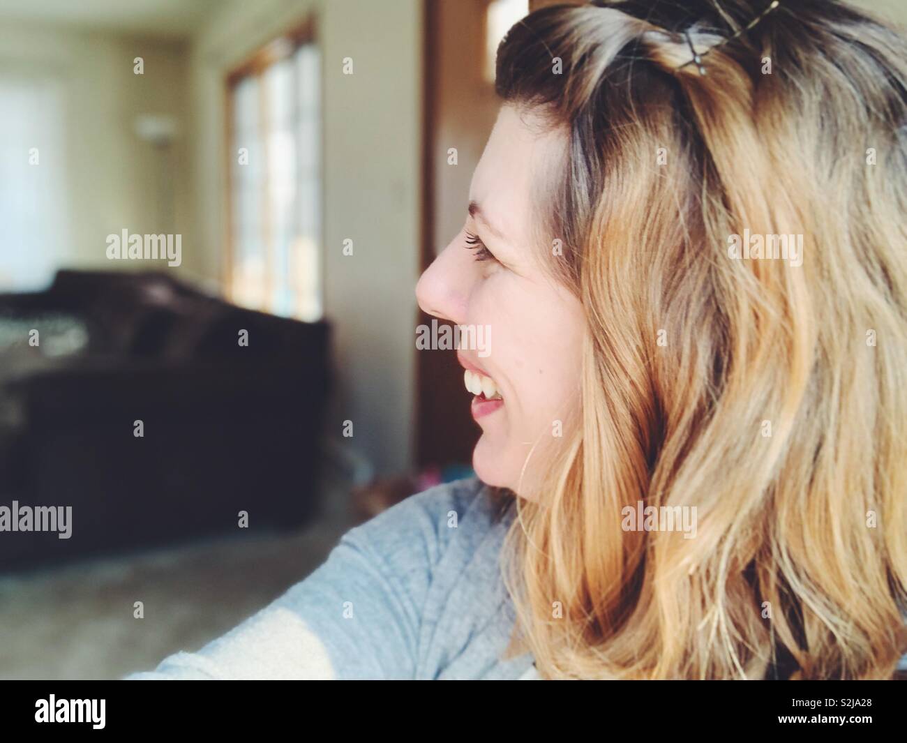 Woman laughing - Smartphone Captured Stock Image