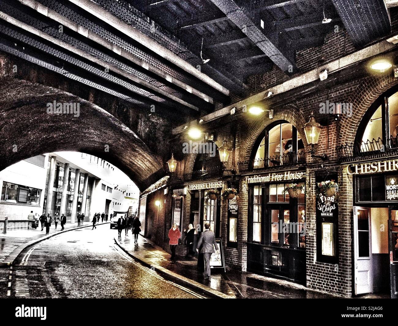 The Cheshire Cheese pub under the railway arches of Fenchurch street station in the City of
