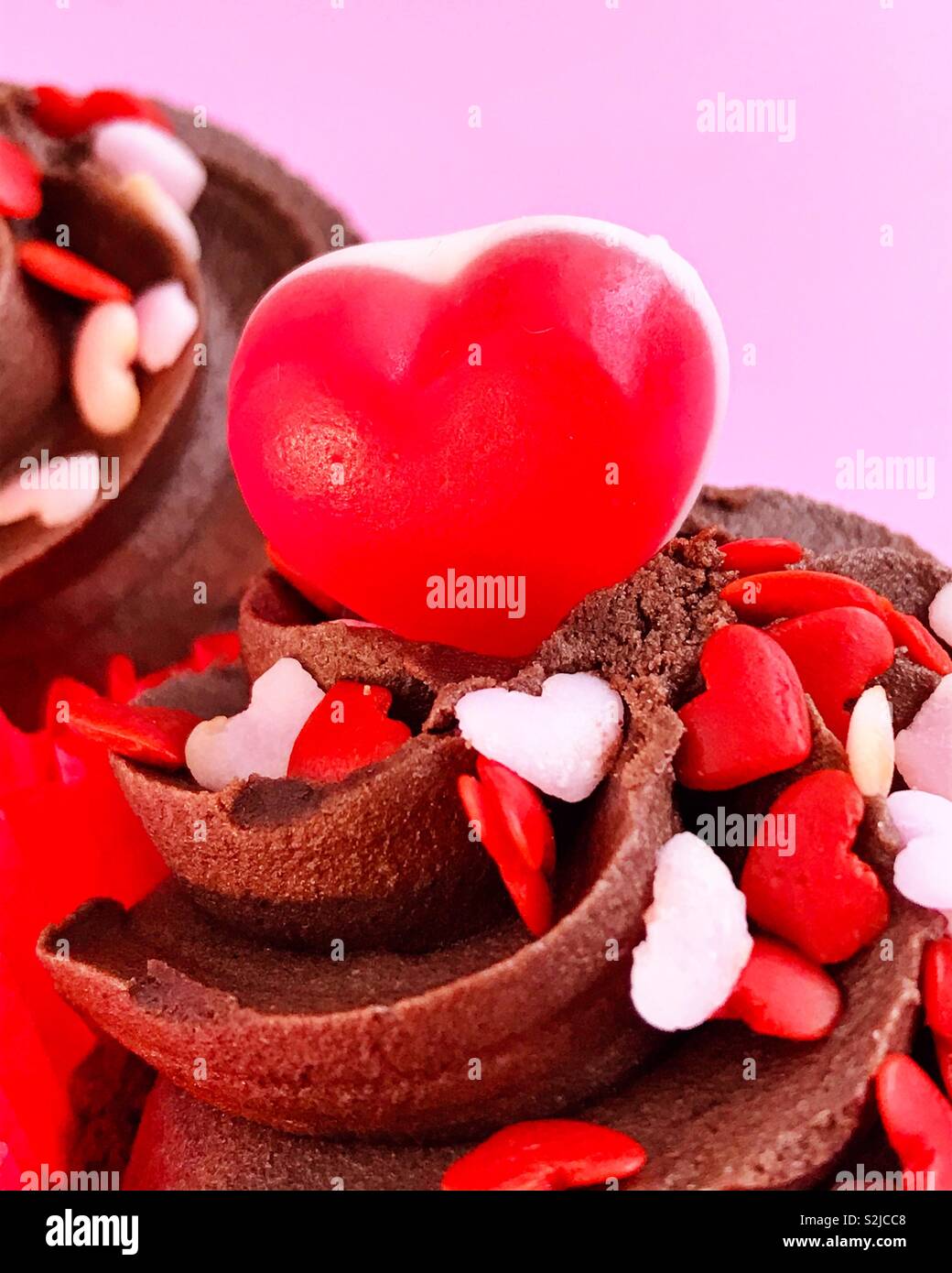 Close up detail on a love themed cup cake - Smartphone Captured Stock Image