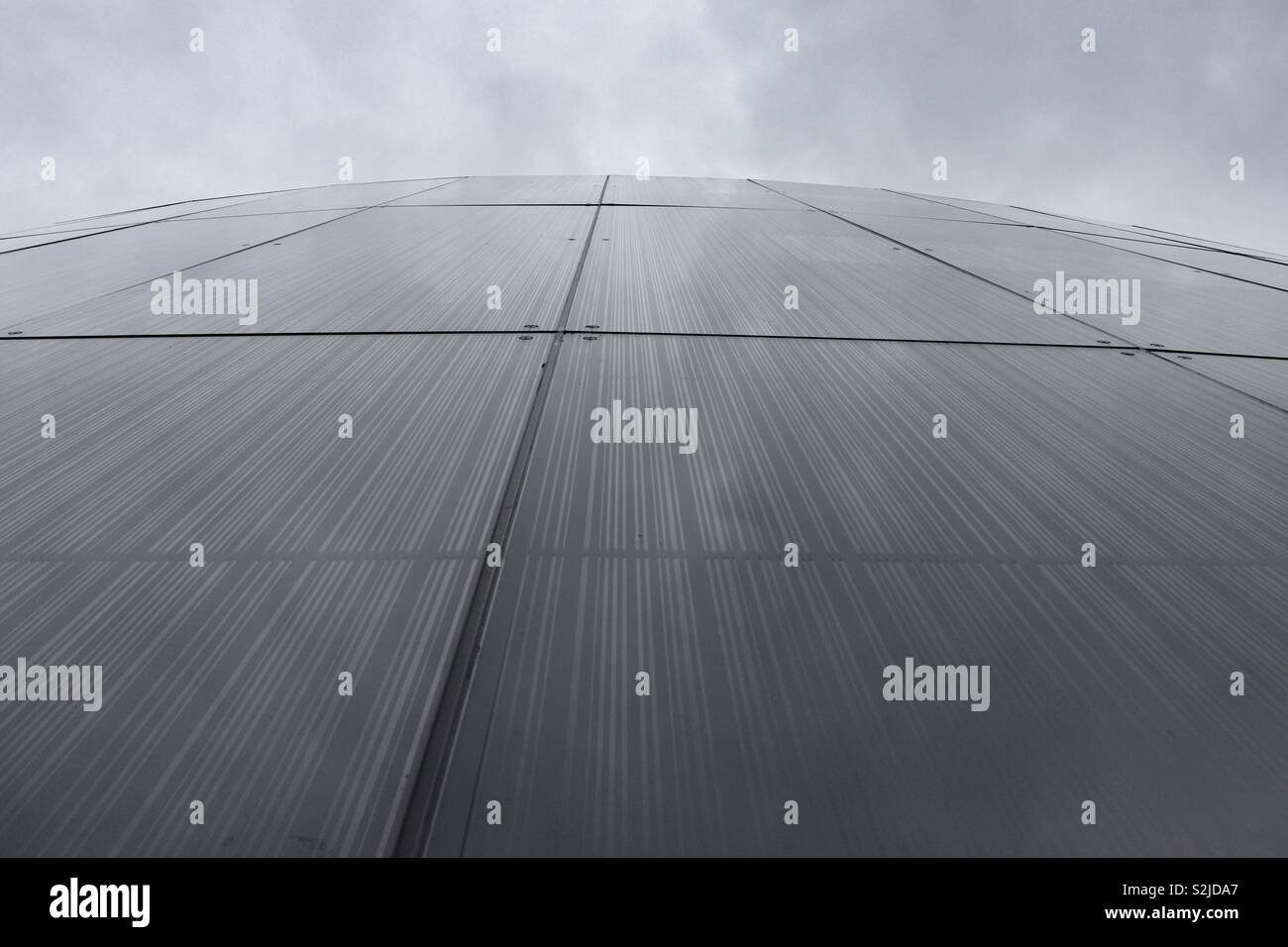 Abstract vertical view of building glass facade Stock Photo