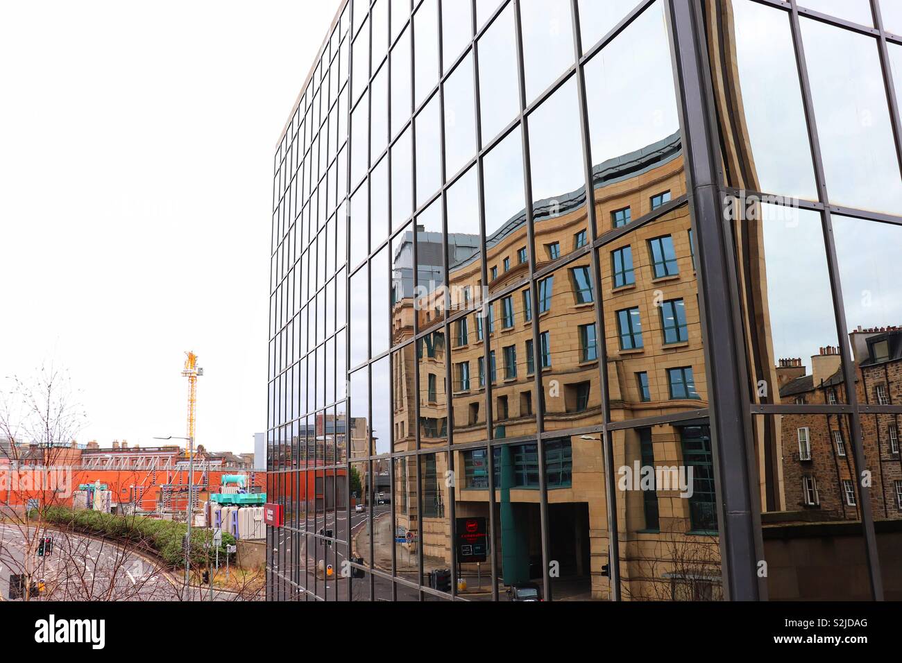 One building reflected within another Stock Photo