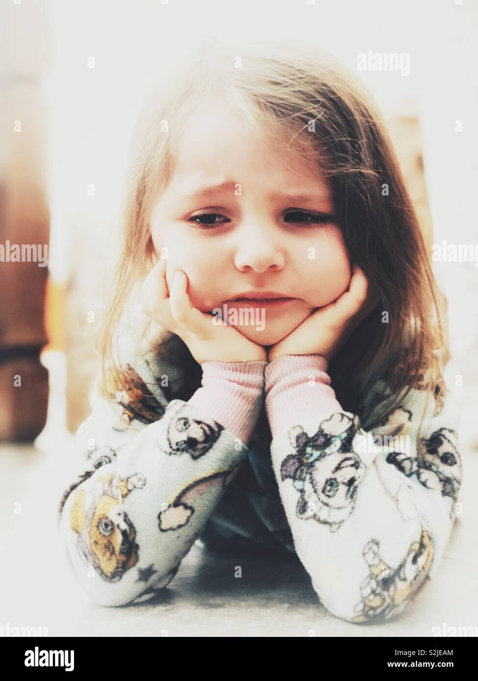 Sad, crying 3 year old girl - Smartphone Captured Stock Image