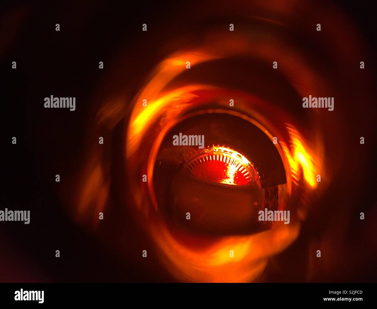 Inside of a brown beer bottle. Abstract light - Smartphone Captured Stock Image