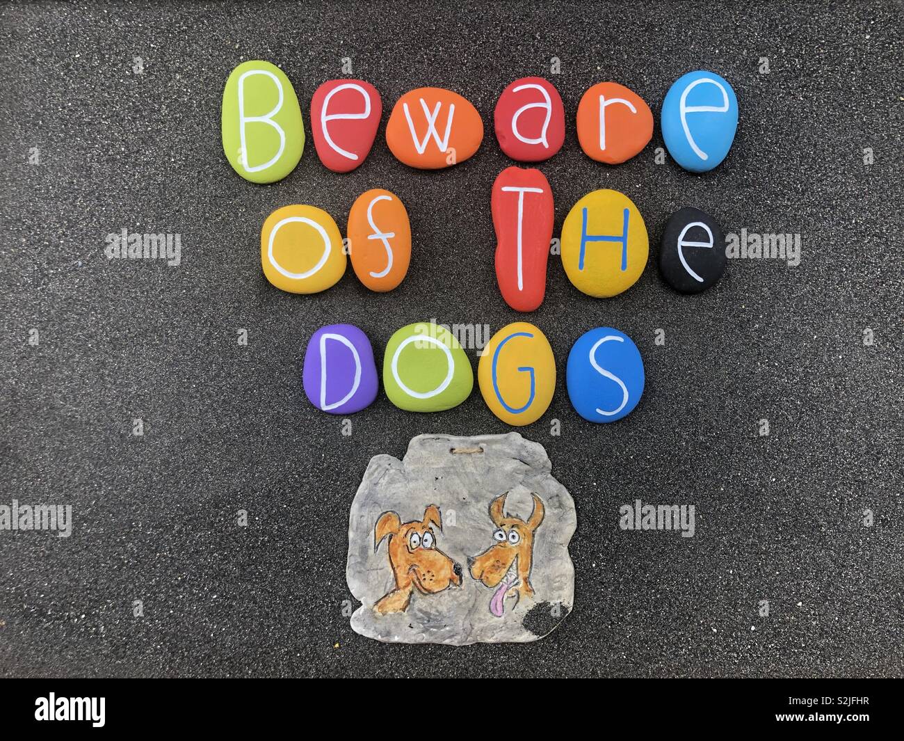 Beware of the dogs, enter at your own risk - Smartphone Captured Stock Image