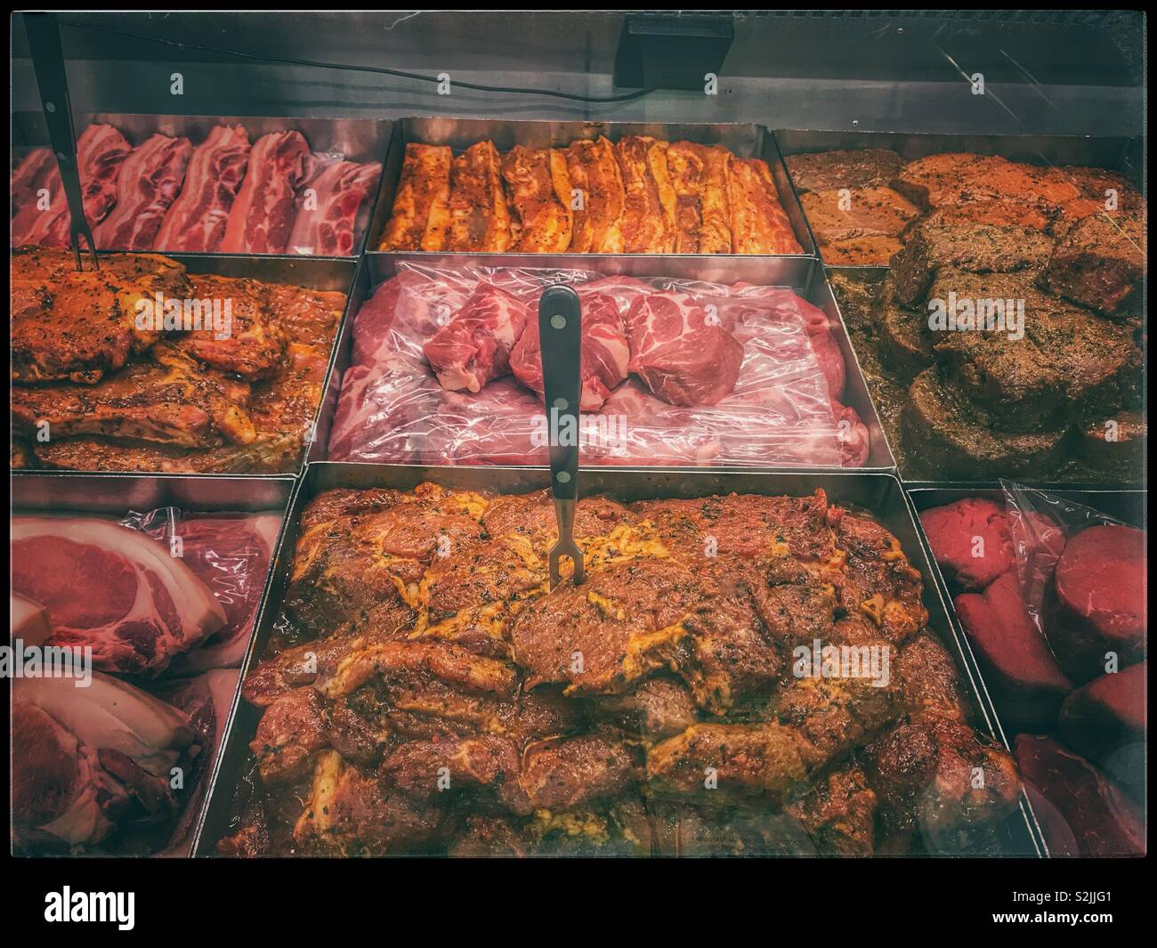 Fresh meat counter at deli. - Smartphone Captured Stock Image