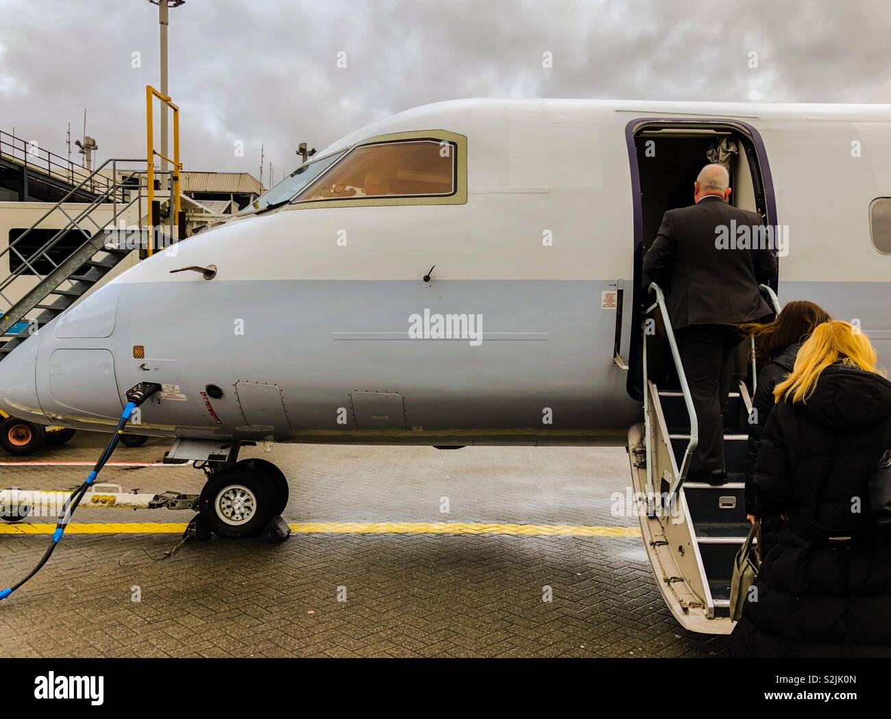 Passengers boarding plane at Birmingham airport. UK. - Smartphone Captured Stock Image